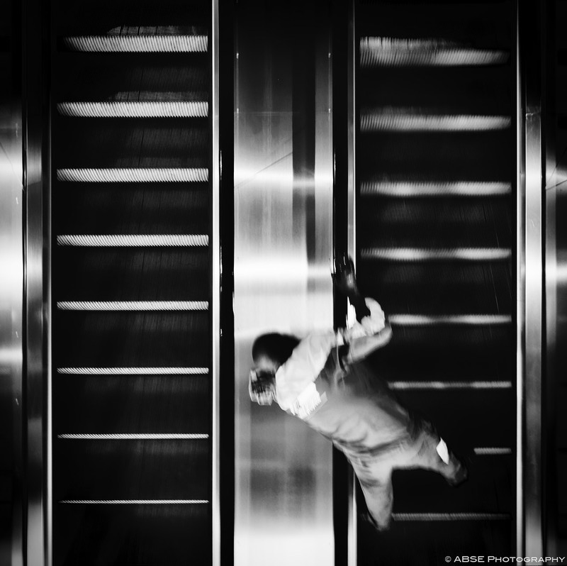 http://blog.absephotography.com/wp-content/uploads/2015/11/paris-cleaning-escalator-colors-black-and-white-800x798.jpg