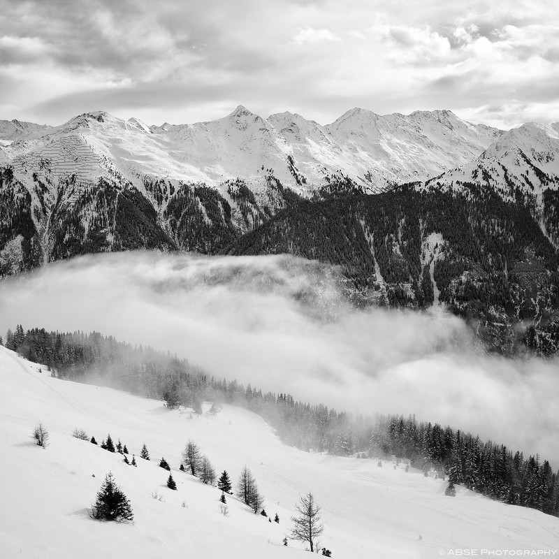 kappl-tirol-austria-mountains-snow-trees-clouds